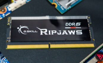 DDR5 RAM sticks lying on a computer motherboard